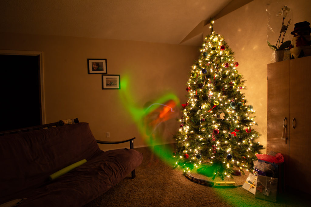 Long exposure with my niece and nephew "painting light" at Christmas. Photo by Shane Cotee.